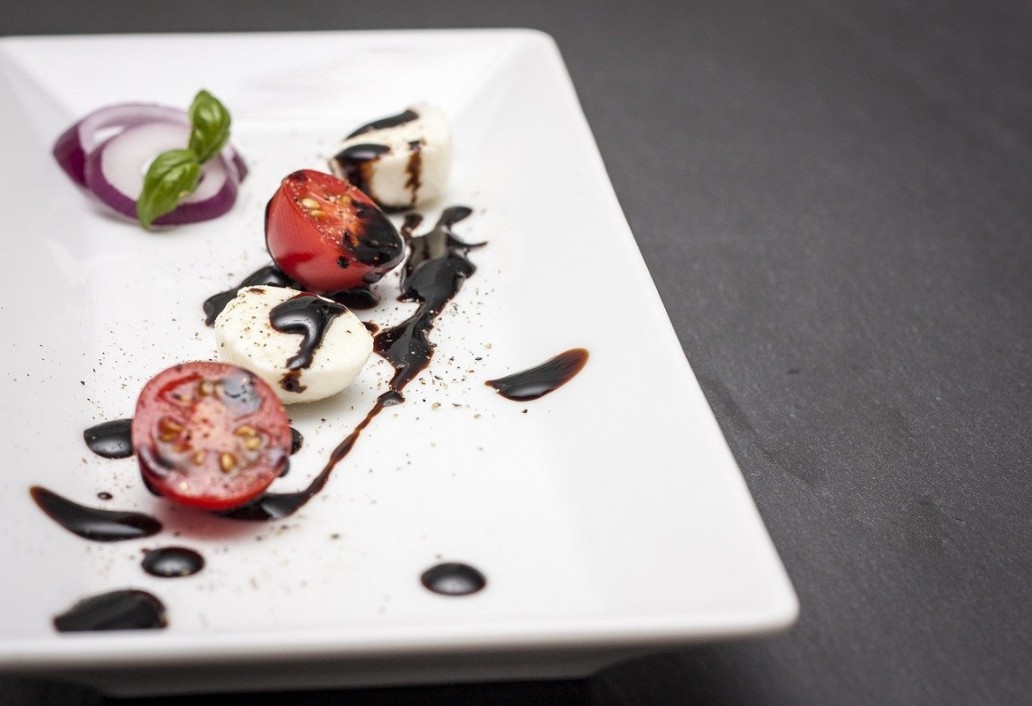 mozzarella and tomatoes dressed with balsamic vinegar from Modena I.G.P.