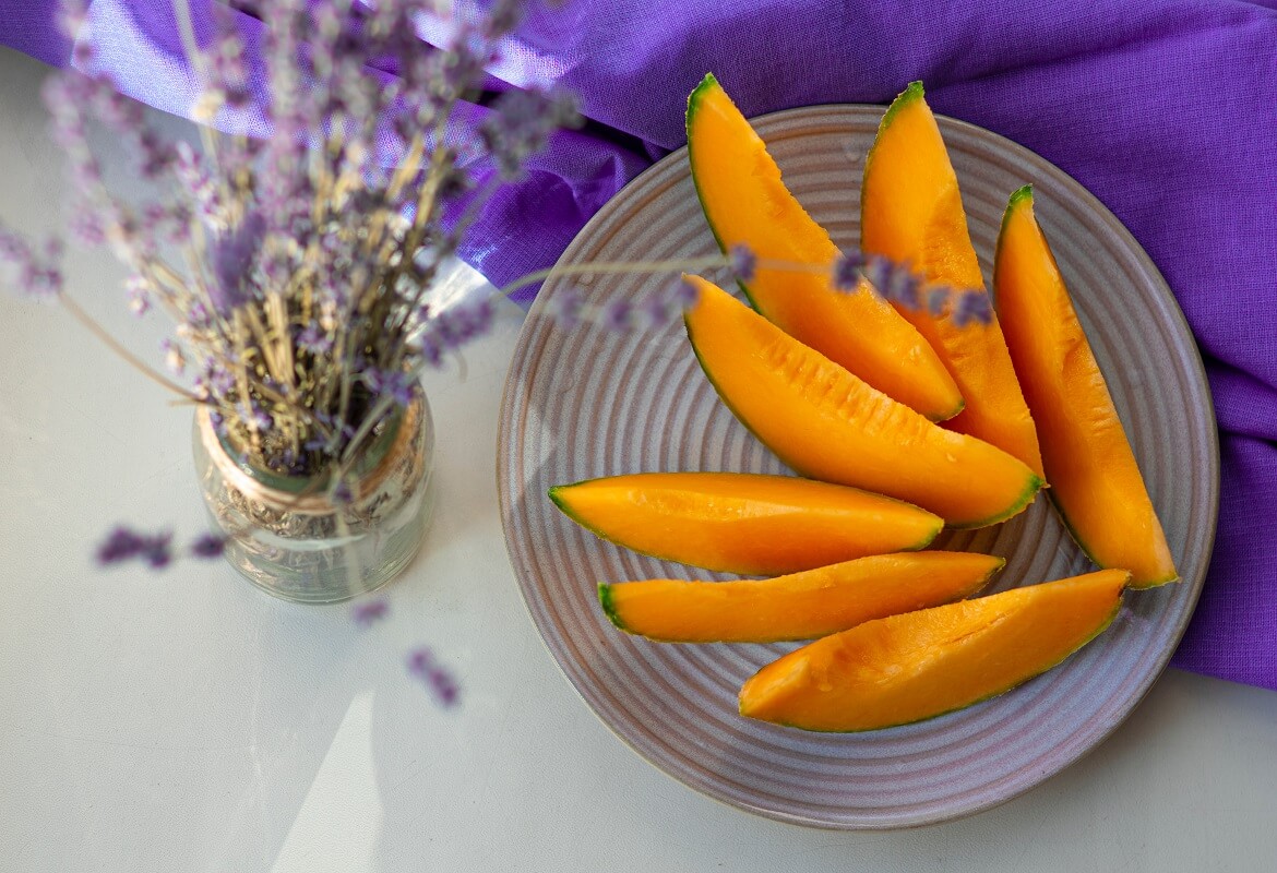 sliced melon - fruit with balsamic vinegar of modena 